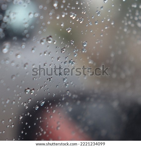 KOTA KINABALU SABAH,MALAYSIA-1 NOVEMBER 2022: A raindrop that hits the car's windscreen in the evening.