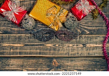 Christmas wooden background with gifts is a place to copy.