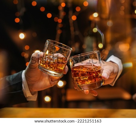 whiskey, for a friendly party in a bar or a restaurant. Royalty-Free Stock Photo #2221251163