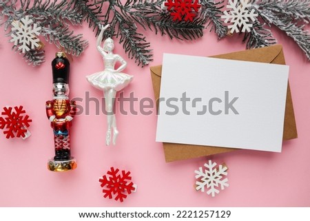 christmas card for children. ballerina and nutcracker figurine on christmas tree