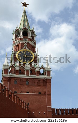 The Moscow Kremlin. Spasskaya Tower. View of the background of the summer sky with clouds