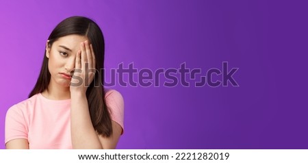 Close-up tired upset girl feeling loser, punch face, make facepalm sign sighing sorrow, exhausted doing hard homework, stand unhappy purple background, regret missed chance. Copy space Royalty-Free Stock Photo #2221282019
