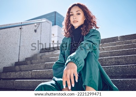 Fashion, travel and woman student on building steps in a city, with vision for mission, goal and mindset. Portrait, girl and exchange student on a solo trip in New York, proud and confident downtown Royalty-Free Stock Photo #2221299471