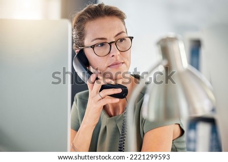 Telephone, phone call and business woman in office, talking and thinking. Landline, communication and female employee from Canada on call speaking, chatting or work discussion in company workplace. Royalty-Free Stock Photo #2221299593