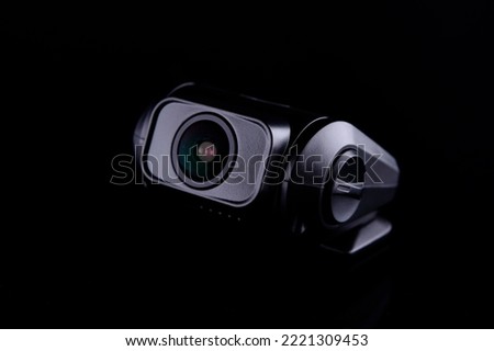 Car CCTV dash camera for safety on the road to record accidents. Front and rear lenses on black background Royalty-Free Stock Photo #2221309453