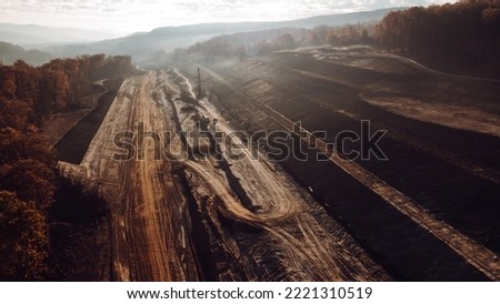Construction of a new highway. Construction stage. Road layers and earth moving. The composition of the road during its construction