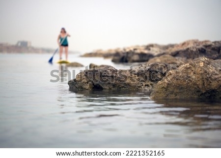sailing on the sea on a SUP board.Stand Up Paddle