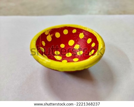 Picture of lit diya lamp made of clay used for decoration on houses on the festival of Diwali. Deepavli or Dipavali celebration.