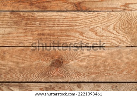 Uncolored wooden wall made of rough boards, close up, front view, background photo texture