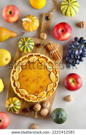 Pumpkin pie on a gray background