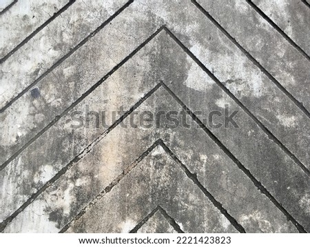 Arrow lines cement floor texture pattern background 