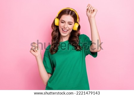 Close up photo cheerful positive overjoyed lady clubber dj wear stylish green clothes good mood isolated on pink color background