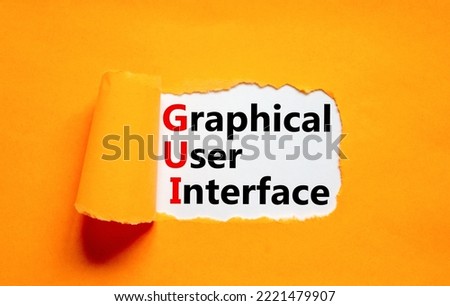 GUI graphical user interface symbol. Concept words GUI graphical user interface on white paper on a beautiful orange background. Business and GUI graphical user interface concept. Copy space.