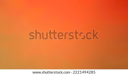 Abstract orange background. Blurry backdrop for designs. Web banner photo. Copy space.