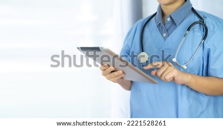 Doctor holding tablet Healthcare And Medicine concept. Doctor, Nurse 