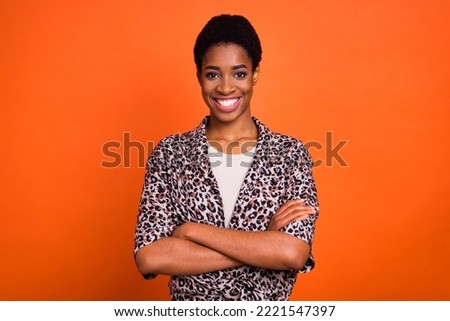 Photo of successful positive person crossed arms toothy smile look camera isolated on orange color background Royalty-Free Stock Photo #2221547397