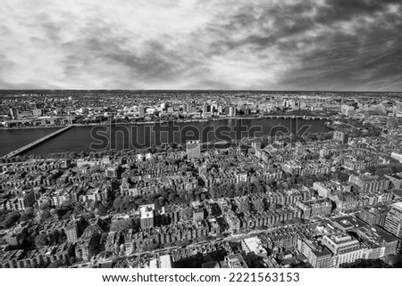 Boston aerial skyline. Small houses and city river on a sunny day. Massachusetts, USA