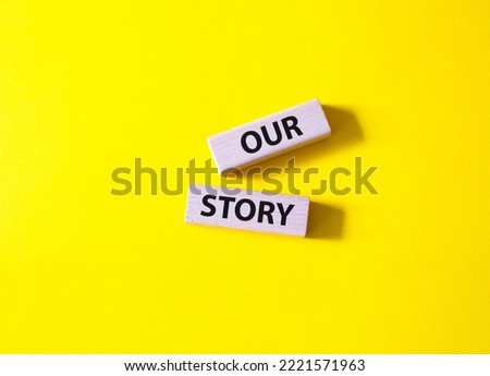 Our story symbol. Wooden blocks with words Our story Beautiful yellow background. Business and Our story concept. Copy space.
