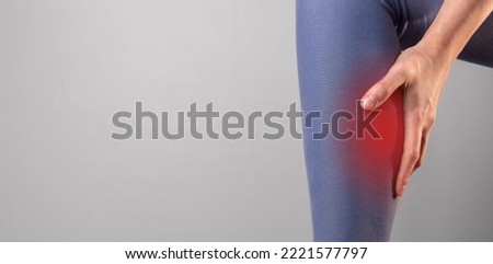Calf pain, shin muscles spasm, cramp, sprain. Medical banner background with copy space for text. High quality photo