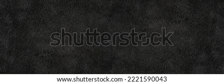 Black suede close-up. Natural black suede texture for design or project. Velvet, leather reverse. Royalty-Free Stock Photo #2221590043