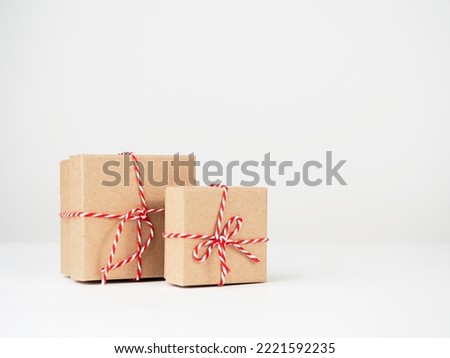 Boxes of gifts on a light background.The concept of buying gifts for the holidays.
