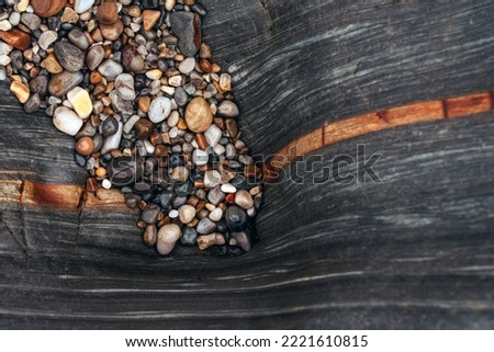 Natural rock texture of a colorful rock formations in Gueirúa beach (playa del Gueirua) in Asturias, north of Spain.