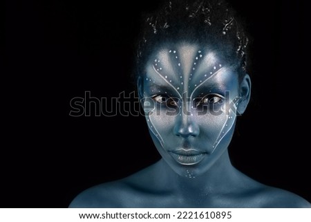 Art photo of Africal woman with tribal ethnic paintings in Avatar style