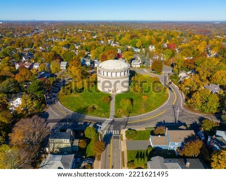 Arlington Reservoir aerial view in fall on Park Circle in town of Arlington, Massachusetts MA, USA. This water tower was built in 1920 with Classical Revival style.  Royalty-Free Stock Photo #2221621495