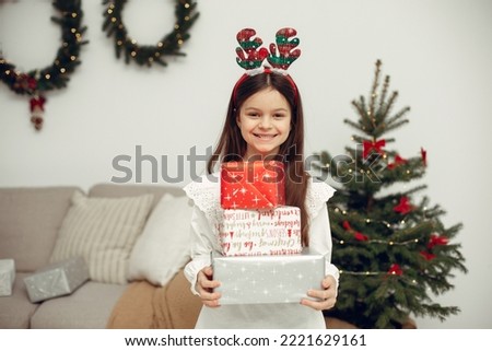 Little girl spends time in the holiday room
