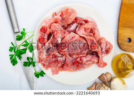 Raw rabbit meat with natural ingredients before cooking, nobody