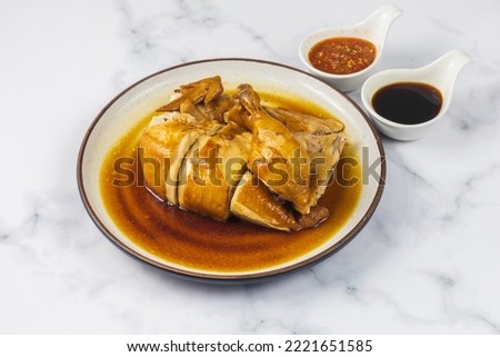 Half Whole of Boiled Chicken Breed in Fish Sauce Royalty-Free Stock Photo #2221651585