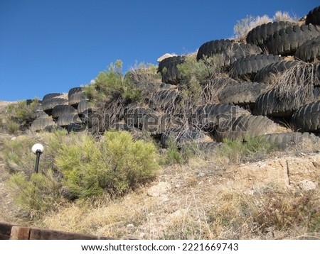 Wall of Large Tires Outside in Arizona