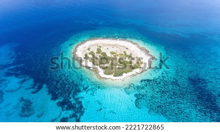 Aerial photography of the island's surroundings through bodies of water