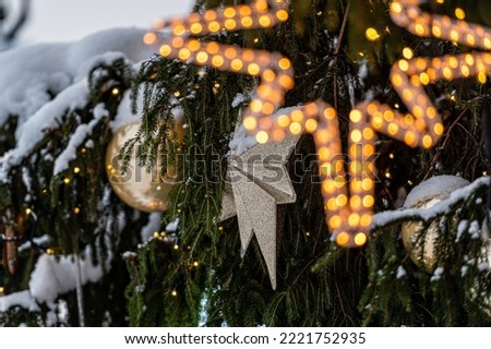 Decorated christmas tree pine on blurred background, bokeh light banner