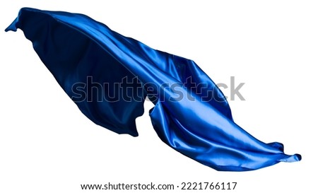 Blue cloth flutters in the wind. Isolated on white background