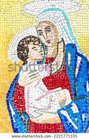 Colorful mosaic representing Mary with the baby Jesus.