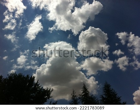 Gray clouds and blue sky. Background of storm clouds before a thunder-storm