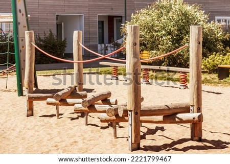 Playground for Children with Modern Wooden Climb Frame.  Equipment for Climbing or Playing.