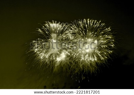 Retro holiday fireworks background with sparks, colored stars and bright nebula on black night sky universe. Amazing beauty colorful fireworks display on celebration, showing. Holidays backgrounds