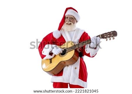 Santa Claus playing guitar and singing on white background isolated. Senior male actor old man with a real white beard in the role of Father Christmas