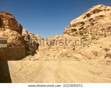 Petra, Jordan, November 2019 - A group of people on a rocky hill