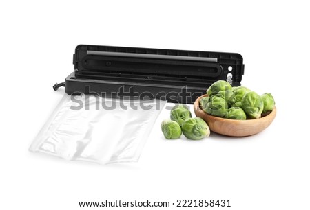 Sealer for vacuum packing, plastic bag and fresh Brussels sprouts on white background Royalty-Free Stock Photo #2221858431