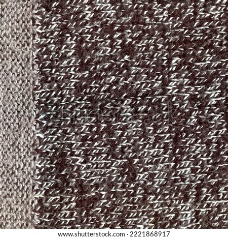 Pattern fabric made of wool. Handmade knitted fabric grey wool background texture