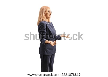 Confused mature businesswoman gesturing with hands isolated on white background