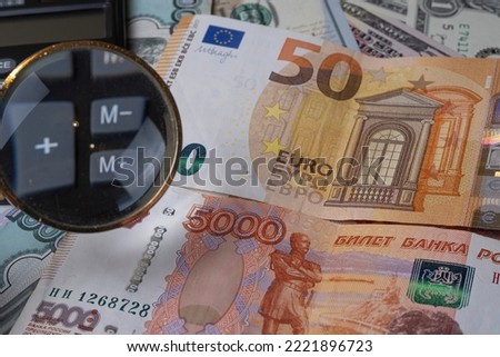 50 euro banknotes and Russian ruble cash, close-up
