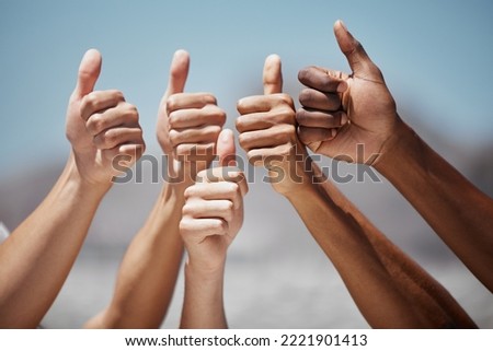 Thumbs up, hands and community fo people, friends or team together for motivation, thank you and support for vote outdoor. Group of men and women together for yes sign review for teamwork and success Royalty-Free Stock Photo #2221901413