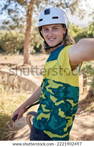 Cycling selfie, mountain bike travel and man taking phone picture while on bicycle journey for fitness, exercise or workout. Peace, freedom and training portrait of adventure cyclist in nature forest