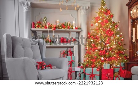 Happy new year interior christmas background. Red Decorated glowing tree, armchair with gifts box, fireplace with candles sunlight.