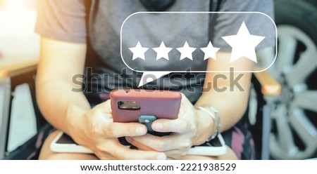Users rate the service experience on the online application Concept : Customer Satisfaction Survey after using the service.
