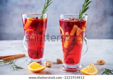 Cranberry orange sangria in a glass. tinting. selective focus
